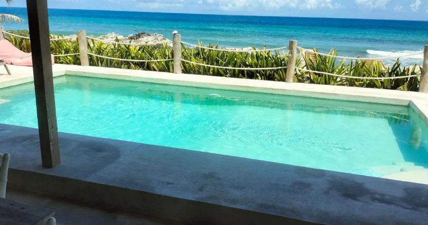 Outdoor pool overlooking the Caribbean Sea at Punta Piedra Studios