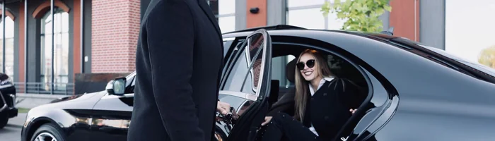 Driver greeting a passenger